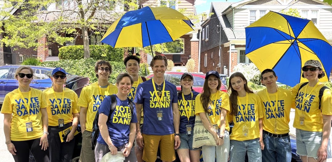 James Dann with the campaign canvass team in VOTE JAMES DANN shirts on a Ward 19 street